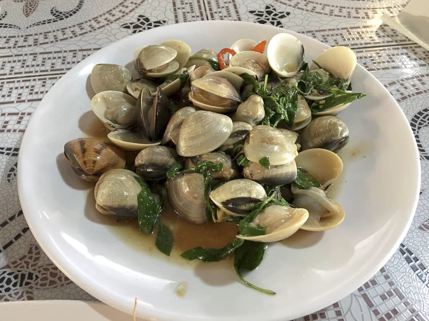Stir-fried clams with basil at Khao Takiab