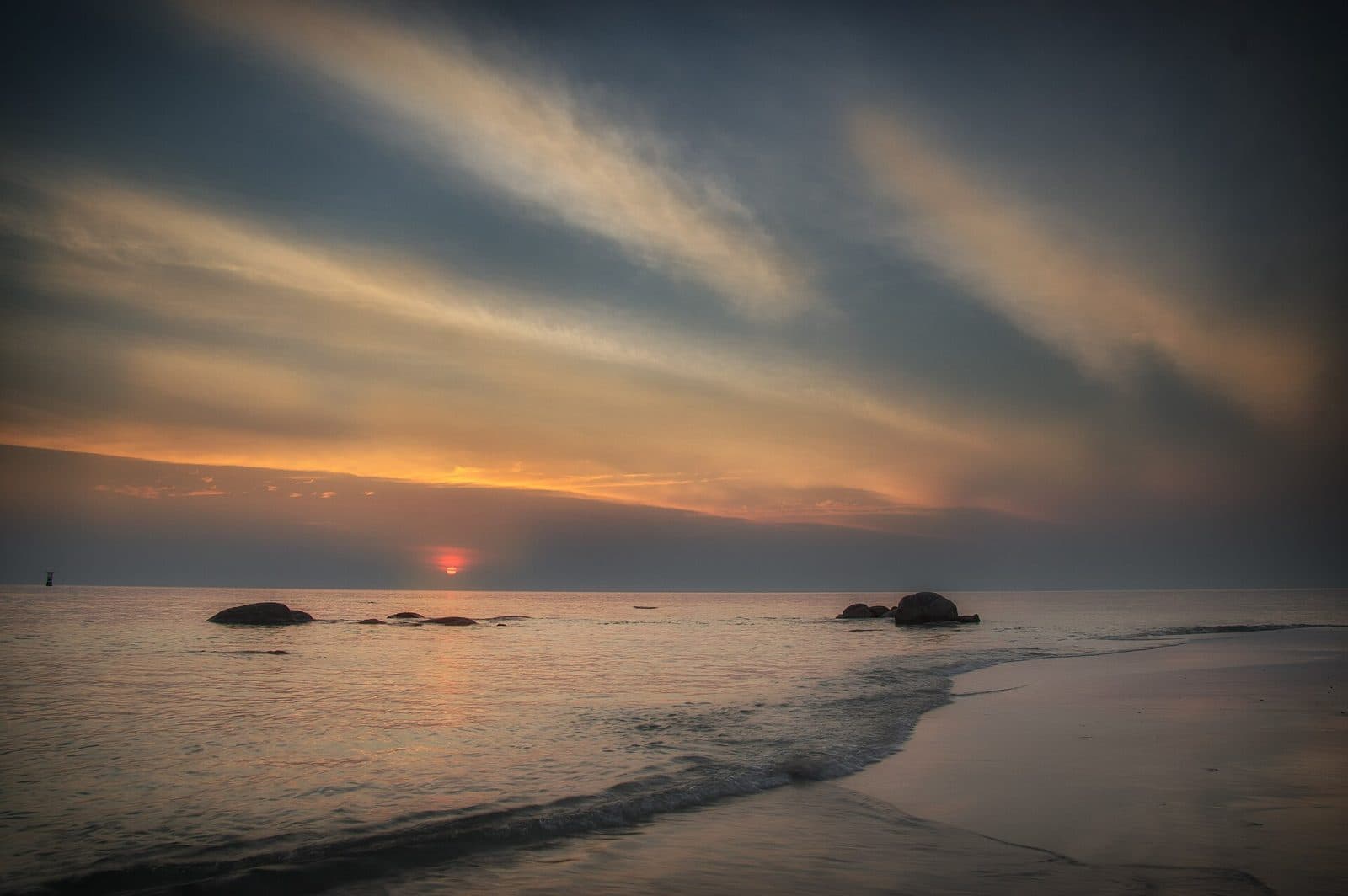Sunrise over the public beach in Hua Hin