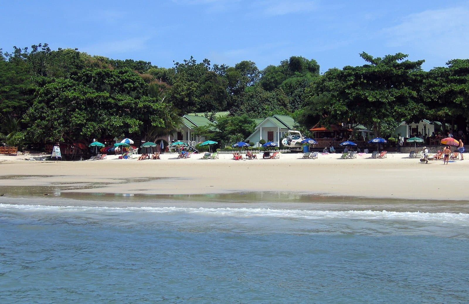 Bungalows and beach umbrellas at Ao Phai, Koh Samet