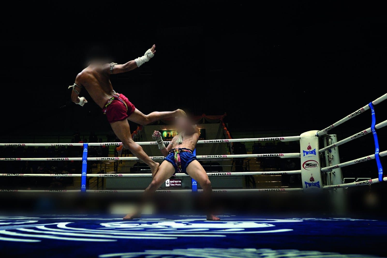 A Muay Thai fight in a Bangkok stadium